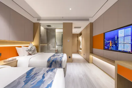 Yuebanwan Hotel (Qujing Railway Station) Отели в г. Цюйцзин