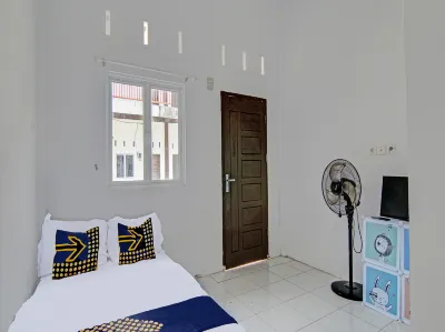 Spot on 91828 Homestay Dinda Syariah Near Masjid Al Amin Hotels in Siak Hulu