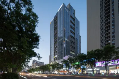 Xixuan Hotel (Korla Peacock River Sailing Plaza) Hoteles cerca de People's Square