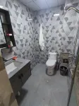 Muli Yinfeng Hotel - Bãi đậu xe