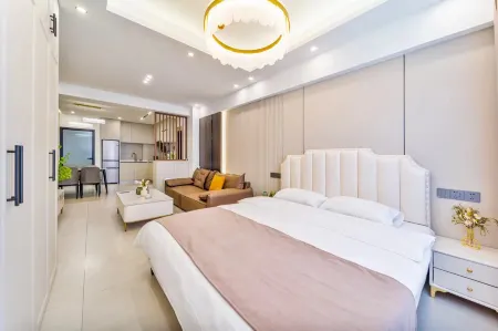 Tata Su Apartment (Harbin Ice and Snow World Sunac Land) Отели рядом с достопримечательностью «Heilongjiang Infotech Profession College (Xueyuan Road)»