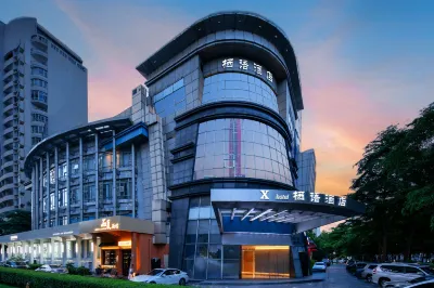 Qiyu Hotel (Futian Port Branch of Shenzhen Convention and Exhibition Center) Hotel berhampiran Xinghe Coco Park