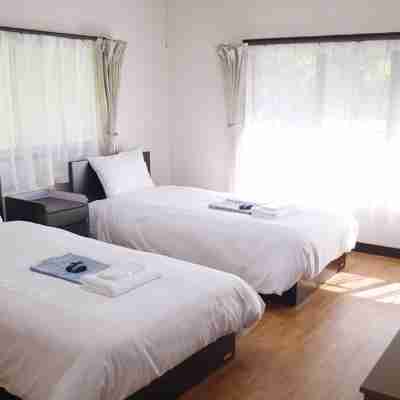 万沢ホテル別草 Rooms