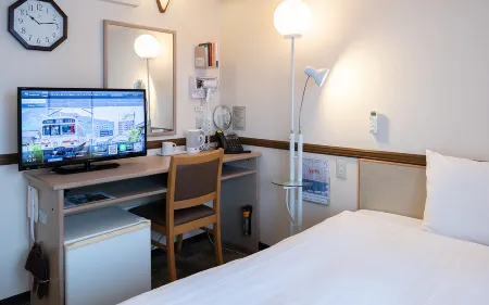 Toyoko Inn Hokkaido Sapporo-Eki Nishi-Guchi Hokudai Mae Отели рядом с достопримечательностью «Shin Kotoni Shrine»