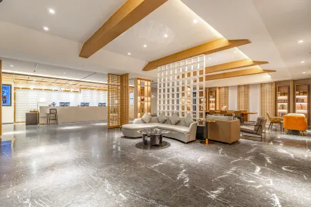 Shanzhiji Hotel (Tingri County Government) Отели в г. Динжи