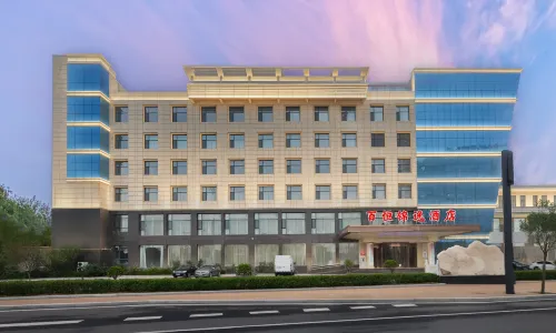 Baiheng Jinyi Hotel (Fushan Yingbin Street)