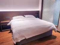 Ningdu San Nongtang City Hotel