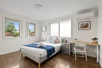 Comfortable Private Rooms – Steps from Train Station