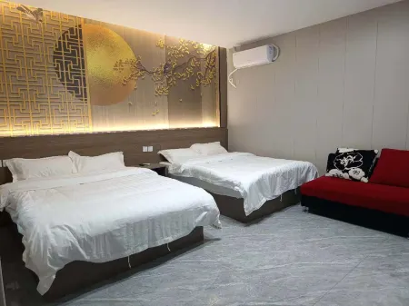 Changqing Business Hotel Отели рядом с достопримечательностью «Baoshan Front Wildlife Park»