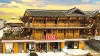 Longshan Jabala Folklore Building Hotels near Rebala Scenic Area