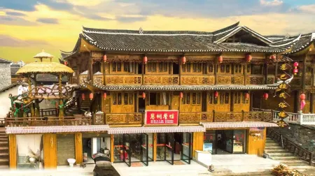 Longshan Jabala Folklore Building Отели рядом с достопримечательностью «Rebala Scenic Area»