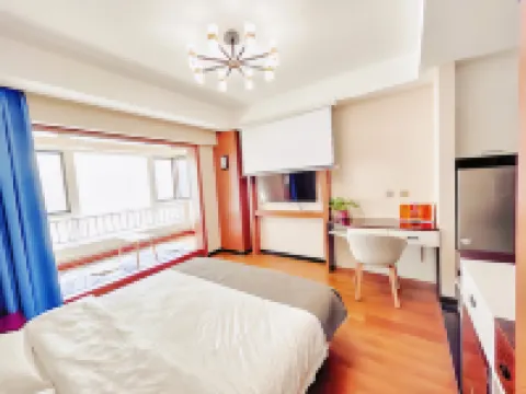 Muhai Lvsu Seaview Apartment (Development Zone Shibeiwan Water Park Branch)