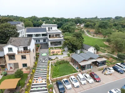 悅伴山水民宿(南京銀杏湖樂園店) 大塘金香草穀附近的飯店