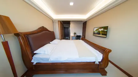 Weihai Gujie Anyi Hotel (Weigao Plaza Xingfumen) Отели рядом с достопримечательностью «Weihai Happiness Gate»