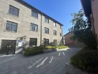 Nanjing Jinpu No. 12 Homestay (Pukou Railway Station Cultural District Store) 푸커우 공원 주변 호텔