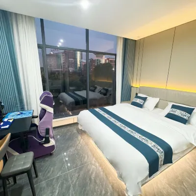 Xingju E-sports Business Hotel (Gongqingcheng High-speed Railway Station) Hotels near Jiuxianling Forest Park
