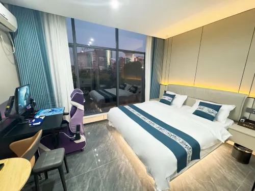 Xingju E-sports Business Hotel (Gongqingcheng High-speed Railway Station) - Parkplatz