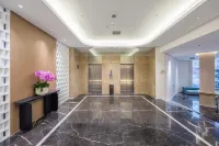 Four Seasons Qingteng Hotel (Ningbo Railway Station Engineering College Cuibai)