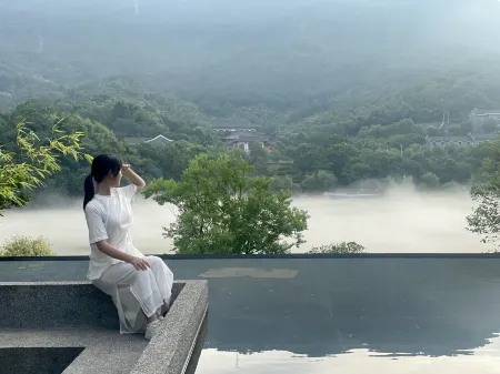 Ximo Guesthouse Отели в г. Цзысин