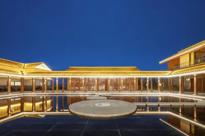 九思山房酒店（桃花山店） 鄰近遂寧喜盈門卡百利藝術塗料高定館的酒店