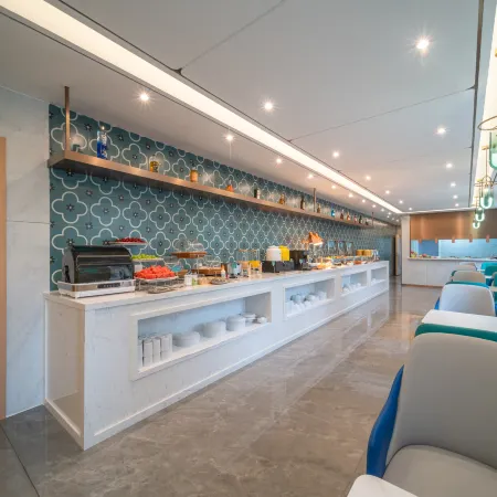 Magnotel Magnolia Hotel (Jiamusi Railway Station New Mart)