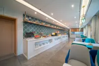 Magnotel Magnolia Hotel (Jiamusi Railway Station New Mart) - sarapan