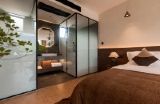 Experience the breathtaking panorama of snow-capped mountains in a luxurious villa.