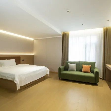 Yujian Hotel (Gushi Xiyalibao Shopping Plaza)