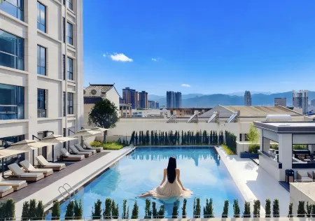 Mile Bonny Hotel Отели рядом с достопримечательностью «Honghe Nativeland»