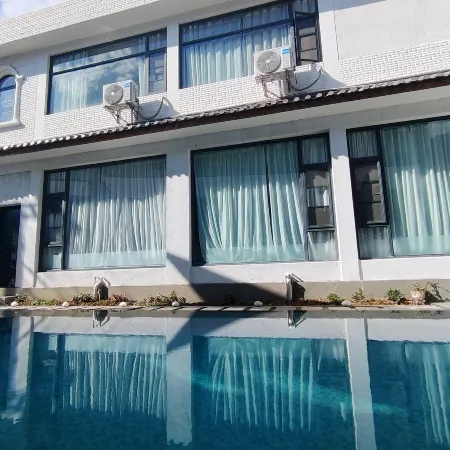 Jingshangtianhua Yuantou Hot Spring Homestay (Eryuan Niujie)