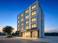 Yihang Holiday Hotel Hotel berhampiran Meilan Intl. Airport