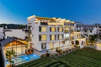 HOUSE ON TEE Hotels near Qinghua Town
