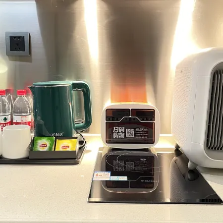 Yuyu International Apartment (Jiangnanxi Jiangtai Road Metro Station Branch) Отели рядом с достопримечательностью «Стадион «Яньцзыган»»