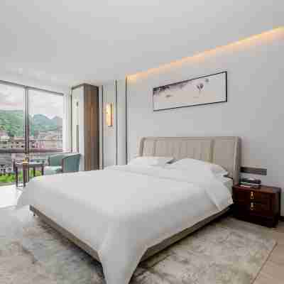 Qixinlong Sightseeing Hotel Rooms