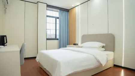 Jianning Jinchuan Business Hotel Отели рядом с достопримечательностью «Jinnaoshan Mountain Star Tunnel»