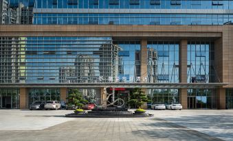 Joyful Tour Grand Rezen Hotel (Zunyi Railway Station)