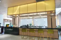 JUNHAO Hotel - بار