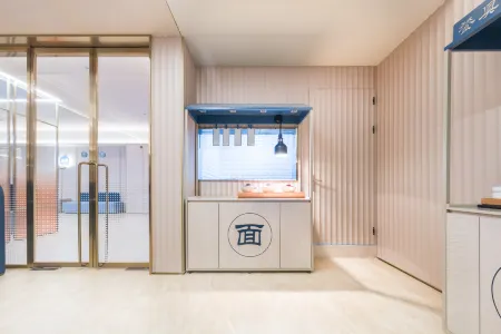 HanTing Hotel (Shanghai Zhoupu Kangpu Road) Отели рядом с достопримечательностью «Shanghai University of Medicine & Health Sciences (Pudong Campus)»