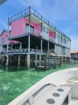 Sunny Holiday Hoteles cerca de Isla Mabul