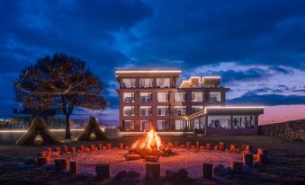 Thousands of Mountains Veiled in Evening Snow • Golden Rays Gilding the Peaks | Panoramic View Hotel