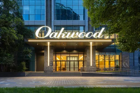 Oakwood Chengzhong Serviced Apartment Wuxi Отели рядом с достопримечательностью «HeZhenLiang Yu AoLinPiKe ChenLieGuan»