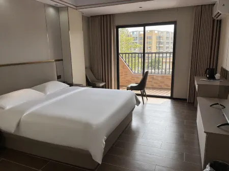 Gangwan Business Hotel Отели рядом с достопримечательностью «Gudou Hot Spring Fortune Cable Car»