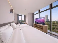 Elong Hotel (Qingdao Oriental Movie Metropolis فنادق في تشينغ داو