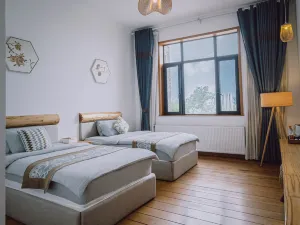 Panhuan Xiaozhu Hotel