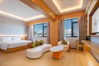 Rezen Pinge Hotel (Xishuangbanna Jinghong Airport Railway Station)