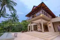 Villa Praison Hôtels à : Plage de Nai Yang
