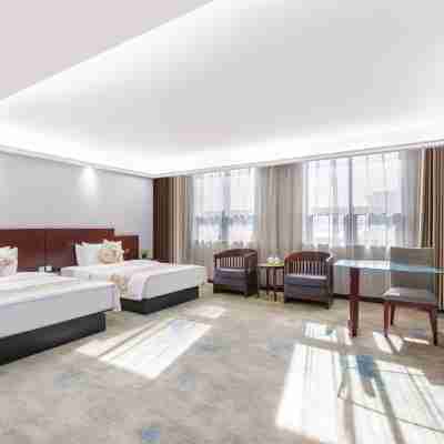 Xingang Holiday Hotel(Xinzheng International Airport Shop) Rooms