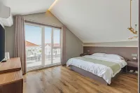 Rizhao Qiduo Homestay (Taohua Island Scenic Area Branch)