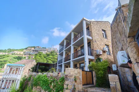 Fishing Village Small Talk Отели рядом с достопримечательностью «Wenling Shitang Peninsula Tourist Resort»