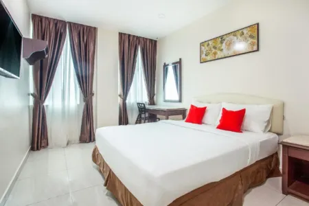 Sam Hotel Sitiawan Отели рядом с достопримечательностью «Tua Pek Kong Temple»